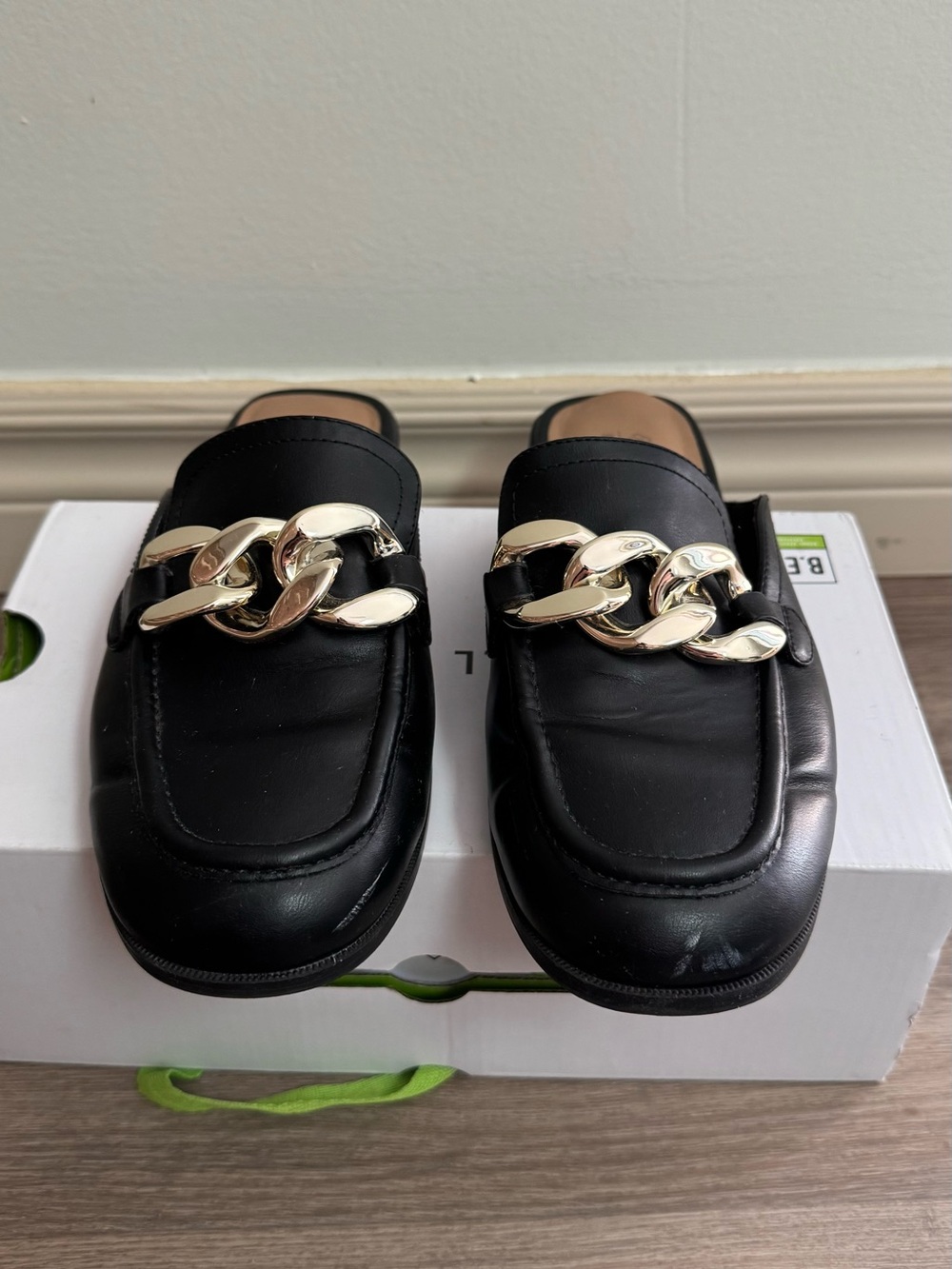 Call It Spring Black Leather Mule Loafers with Gold Chain Accent